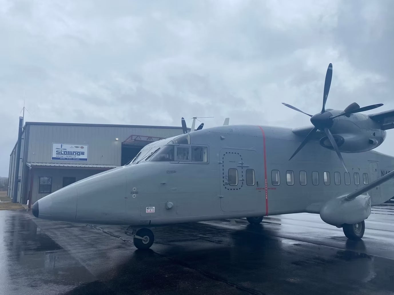 Large turboprop aircraft outside the Stallings facility